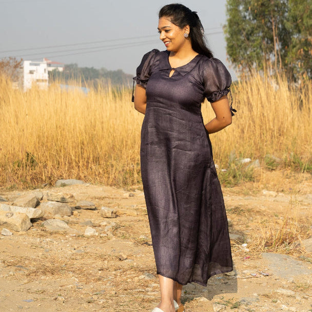 Maxi dress featuring put sleeve tying and Peter Pan collar