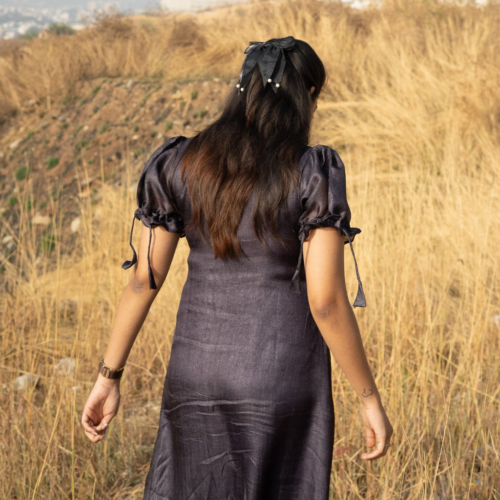 Maxi dress featuring put sleeve tying and Peter Pan collar