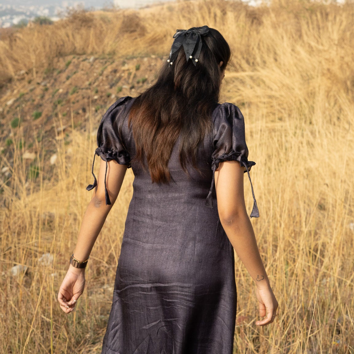 Maxi dress featuring put sleeve tying and Peter Pan collar